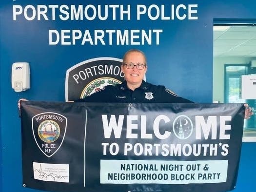 Portsmouth Police Officer Lynn Thomas helps announce National Night Out in Portsmouth on Aug 2.