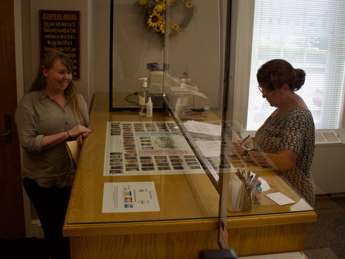 Kelly Halldorson, a candidate for governor, filed hundreds of petition signatures with Concord City Clerk Janice Bonenfant on Aug. 9. 