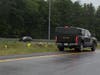 New Hampshire State Police and New Hampshire Fish & Game officers are searching a stretch of highway between Exits 17 and 20 on Aug. 10, for evidence in the Sweeney family triple homicide. 