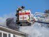 Firefighters from Concord and the capital region spent their Sunday on the Hooksett Turnpike, fighting a house fire.