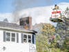 Firefighters from Concord and the capital region spent their Sunday on the Hooksett Turnpike, fighting a house fire.