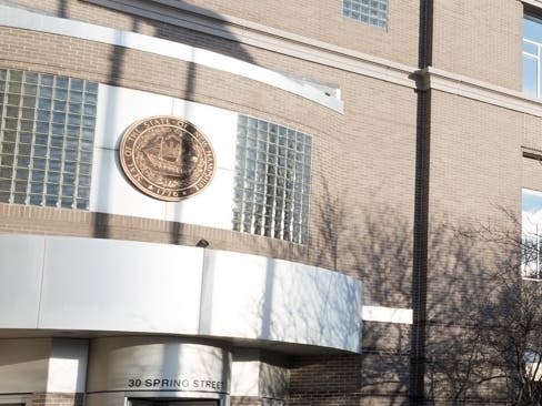 A woman from Manchester, previously convicted on theft charges, faces a felony charge after an incident at the Walmart in Hudson.