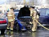 Bow firefighters extinguish a car fire on Dec. 18. 