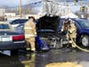 Bow firefighters extinguish a car fire on Dec. 18. 