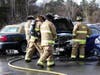 Bow firefighters extinguish a car fire on Dec. 18. 