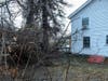 A tree nearly fell into a home on Pleasant Street on Dec. 23. 