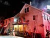 Firefighters put out an apartment fire on Tolles Street on Dec. 24.