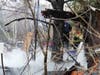 Concord firefighters extinguish a homeless campsite and B&M freight building fire on Jan. 18. Concord police are searching for an arson suspect. 