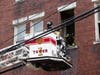 Concord firefighters extinguished a fire inside a unit of South Main Street building on March 26.