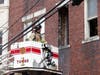 Concord firefighters extinguished a fire inside a unit of South Main Street building on March 26.