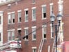 Concord firefighters extinguished a fire inside a unit of South Main Street building on March 26.