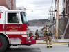 Concord firefighters extinguished a fire inside a unit of South Main Street building on March 26.