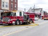 Concord firefighters extinguished a fire inside a unit of South Main Street building on March 26.