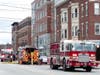 Concord firefighters extinguished a fire inside a unit of South Main Street building on March 26.