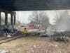 Concord firefighters extinguished a fire under the Interstate 393 bridge off South Commercial Street on April 11. 