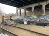 Concord firefighters extinguished a fire under the Interstate 393 bridge off South Commercial Street on April 11. 