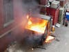 Concord firefighters extinguished a dumpster fire in Bicentennial Square on April 11.