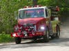 Concord and Webster firefighters battled a forest and brush fire in the city's northwest section on May 17.
