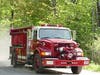 Concord and Webster firefighters battled a forest and brush fire in the city's northwest section on May 17.