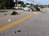 Concord police are investigating a motorcycle and car collision on Loudon Road on Aug. 13 that sent four people to the hospital. A Smith & Wesson handgun, a knife, and a white sneaker were part of the debris on the west side of the crash scene. 
