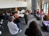 Former students assembled for a tour of Concord High School on Sept. 30, which was renovated in the 1990s, take in the media room and ask, "where are all the books?"