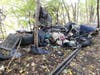 Homeless camp debris Concord along the railroad tracks behind Horseshoe Pond Lane on Oct. 16.