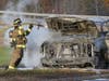 Concord fire and rescue teams extinguish a pickup truck fire on Interstate 93 on Nov. 3. 