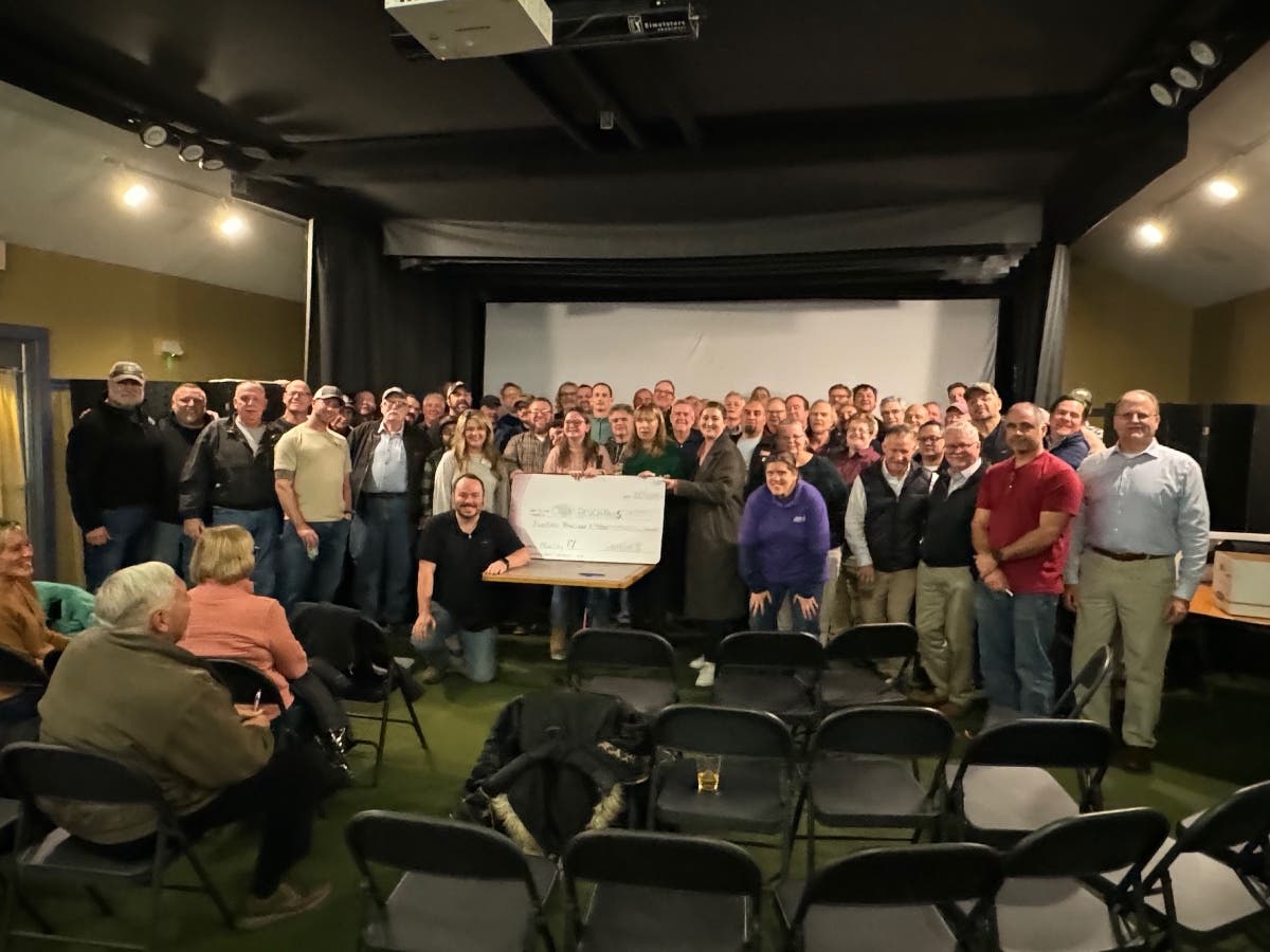 Guys Who Give A $hit and representatives of Camp ExSighting Adventures, Special Olympics NH Athletes, and Care Women’s Center celebrate donations at the Beaver Meadow Golf Course in Concord on Nov. 15.