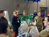 OSC Chairman Phil Burt as Jingles with SEA volunteer Maureen Timmons and National Guard Major General David J. Mikolaities.