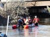 Several homeless campers were rescued from Healy Park after rising Merrimack River water levels flooded the park on Dec. 21.