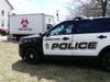 A hazmat team, possibly hired by the state of New Hampshire, has been cleaning up a massive homeless camp off Sexton Avenue for days.