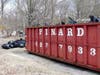 A hazmat team, possibly hired by the state of New Hampshire, has been cleaning up a massive homeless camp off Sexton Avenue for days.
