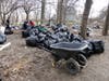 A hazmat team, possibly hired by the state of New Hampshire, has been cleaning up a massive homeless camp off Sexton Avenue for days.