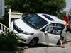 The driver of a Honda Fit crashed into the stairs of a law office on Centre Street in Concord after a collision with an SUV on June 20. 