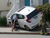 The driver of a Honda Fit crashed into the stairs of a law office on Centre Street in Concord after a collision with an SUV on June 20. 