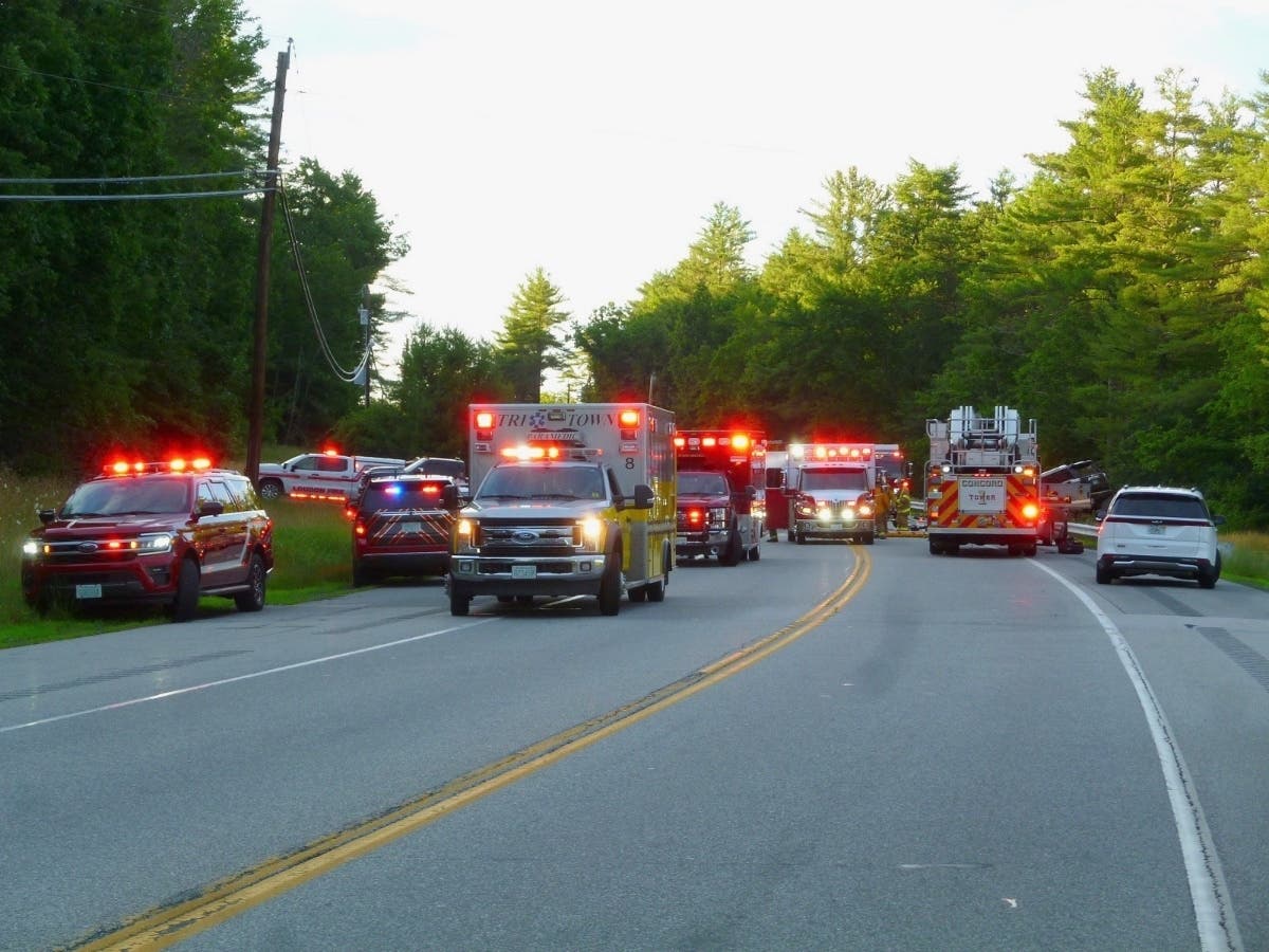 First responders assisted at the scene of a two-vehicle crash in Loudon that killed one child, injured another, and injured three adults on July 12.