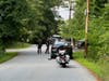 Concord police and state troopers search East Concord on July 22 for a suspect involved in a stolen car case out of Hampton as well as other young men who fled the crash scene on Appleton Street.