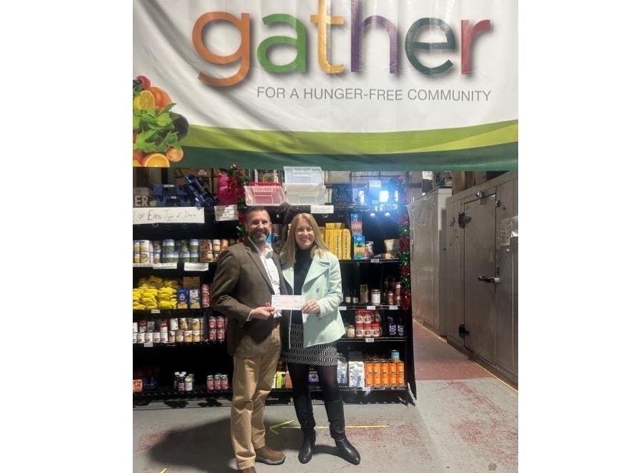 Michael St. Onge, NHTrust SVP, private client relationship manager on left and Anne Hayes, executive director of Gather on the right.