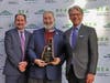 The City of Concord’s Deputy City Manager of Development Matt Walsh, and Mayor Byron Champlin receive designation as a Housing Champion from New Hampshire Department of Business and Economic Affairs Commissioner Taylor Caswell at a ceremony Dec. 18.