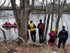 Concord fire and rescue teams search the Merrimack River while police search the shoreline looking for a man who jumped from the Manchester Street bridge on March 20.