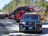 Firefighters and police cleared a crash scene on Route 106 on April 20.