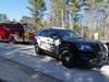 Firefighters and police cleared a crash scene on Route 106 on April 20.