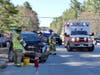 Firefighters and police cleared a crash scene on Route 106 on April 20.
