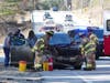Firefighters and police cleared a crash scene on Route 106 on April 20.