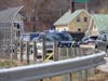 Interstate 393 east is down to one lane off North Main Street after a body was found down the embankment of South Commercial Street on April 22.