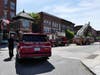 Smoke from the roof of a Downtown Concord building closed North Main Street temporarily on May 28.