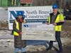 Joseph Campbell (right) of North Branch Construction presenting Kara Lasalle of Lakes Region Community Developers with a check for the proceeds from the North Branch Construction 2025 Annual Safety Fine Program.