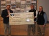 Joseph Campbell (center) of North Branch Construction presenting Jay Garee (left) and Deric Wertz of Scouting America New Hampshire with a check for the proceeds from the North Branch Construction 2025 Annual Safety Fine Program.