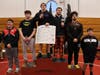 Winners in the 285-pound bracket, including Concord’s Wayne Gutierrez-Sakakeeny, who placed fourth, at the 35th annual Capital City Classic Wrestling Tournament on Jan. 31.