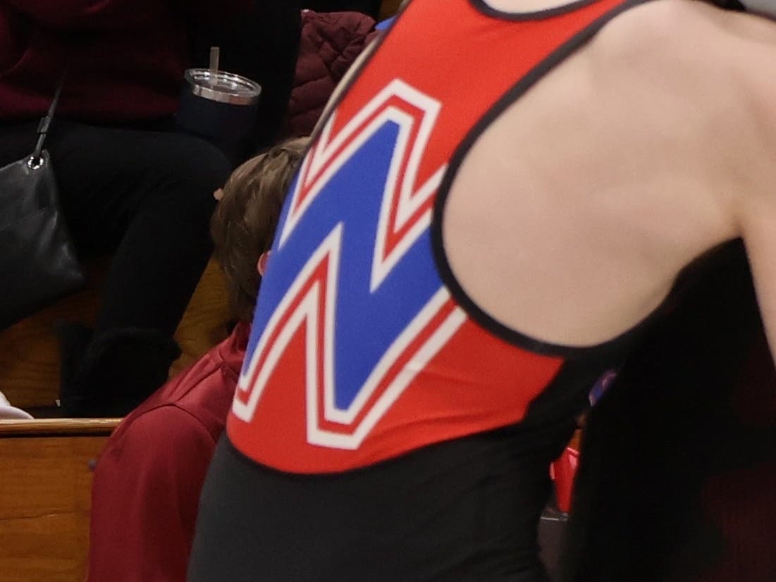 A Winnacunnet wrestler competes in Concord in this file photo.
